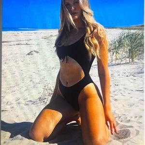 New one -piece suit Soft buttery Fabric.M-sz.